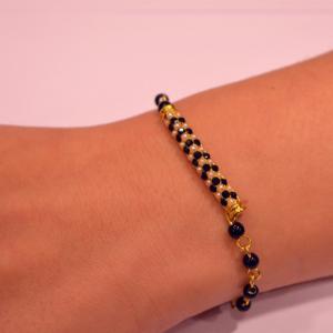 Metal Motif Bracelet with Beads